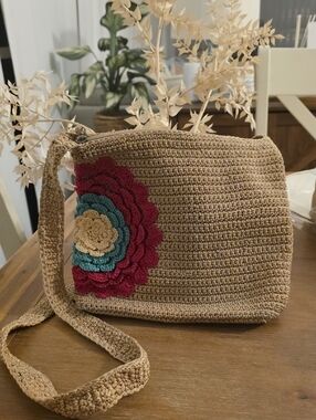 The Sak Tan Crochet Crossbody Bag with Berry, Teal & Cream Flower